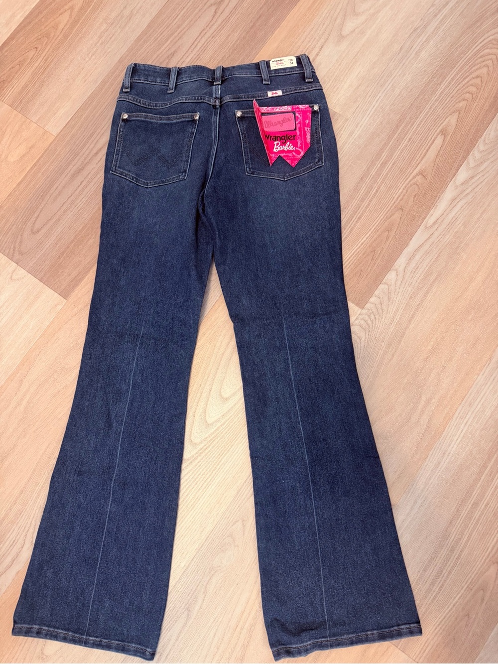 Wrangler Dark Blue Flare Jeans with Pink Pocket Accent
